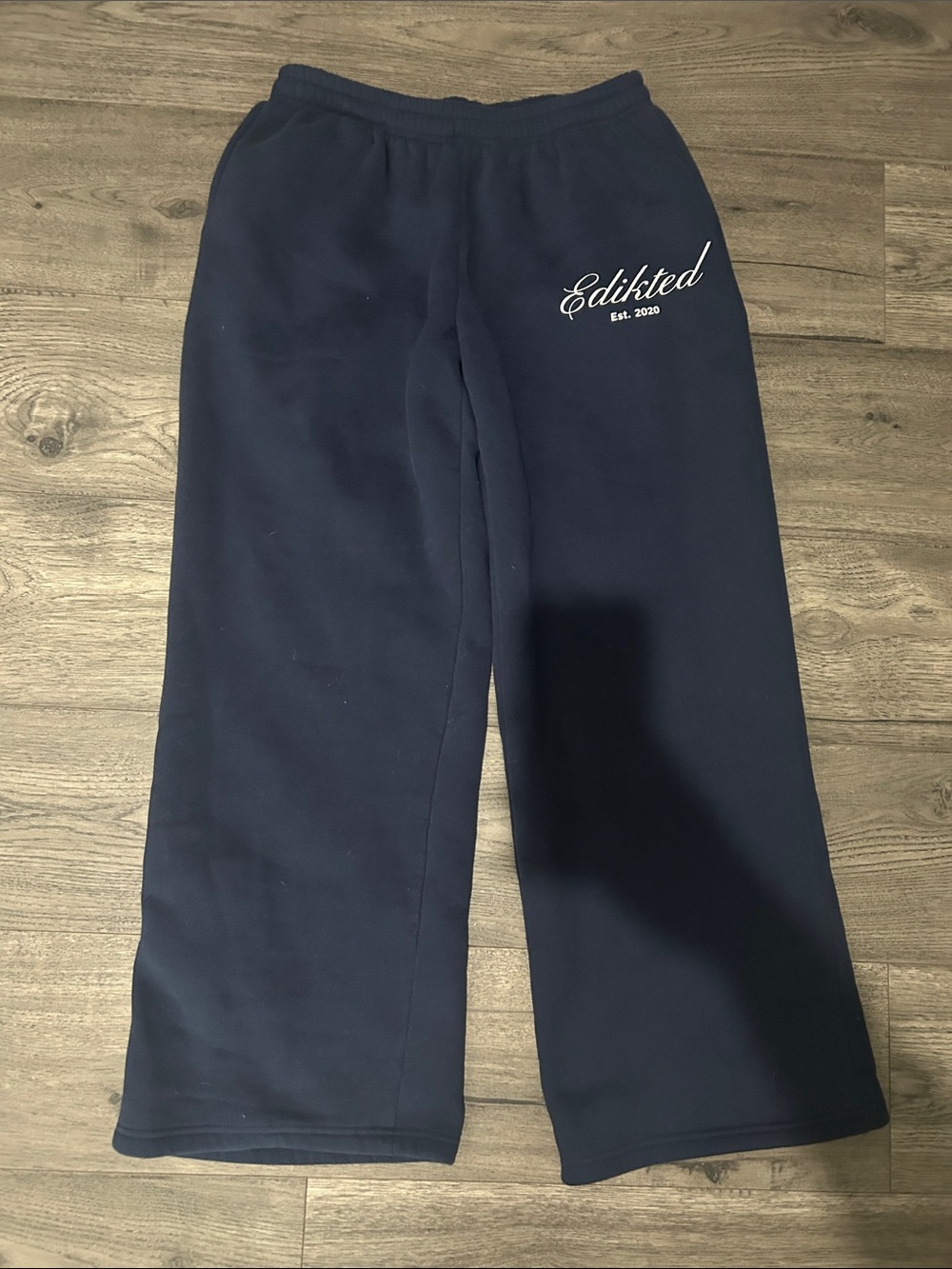 Edikted Navy Blue Wide-Leg Sweatpants with Script Logo